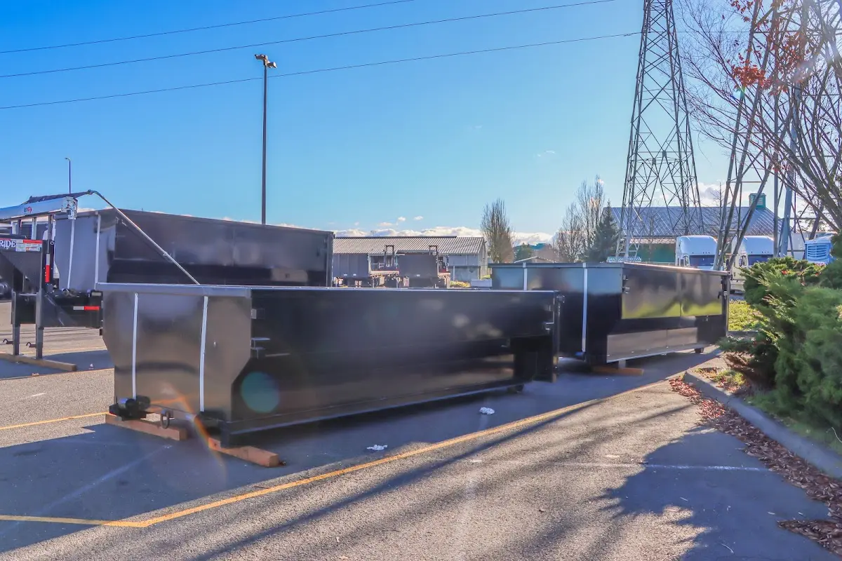 Roll-off dumpster ready for waste disposal at job site for 2 Yard Dumpster Rental in Garden City